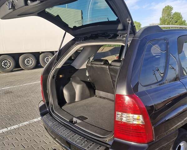 Черный Киа Sportage, объемом двигателя 2 л и пробегом 202 тыс. км за 8300 $, фото 14 на Automoto.ua