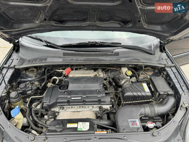 Черный Киа Sportage, объемом двигателя 2 л и пробегом 184 тыс. км за 7999 $, фото 29 на Automoto.ua
