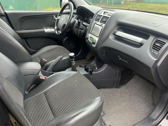 Чорний Кіа Sportage, об'ємом двигуна 2 л та пробігом 237 тис. км за 5100 $, фото 1 на Automoto.ua