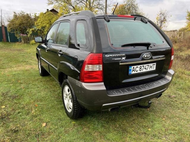 Черный Киа Sportage, объемом двигателя 2 л и пробегом 229 тыс. км за 4600 $, фото 2 на Automoto.ua