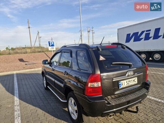 Черный Киа Sportage, объемом двигателя 2 л и пробегом 202 тыс. км за 8300 $, фото 10 на Automoto.ua