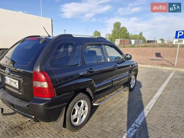 Черный Киа Sportage, объемом двигателя 2 л и пробегом 202 тыс. км за 8300 $, фото 3 на Automoto.ua