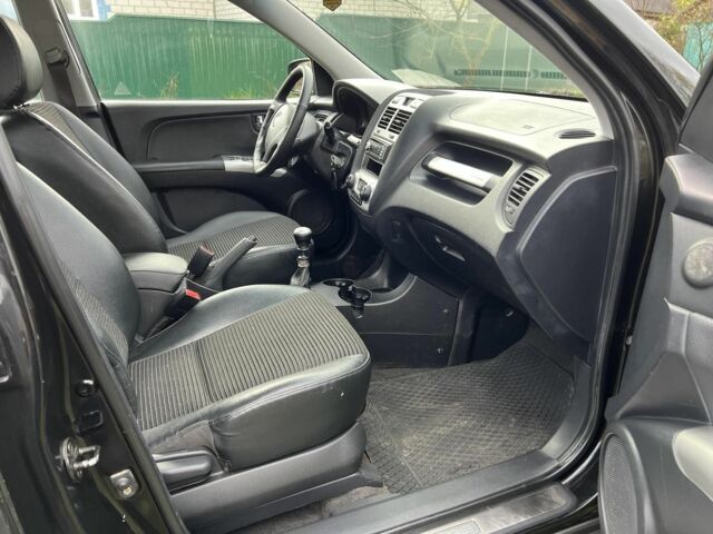 Черный Киа Sportage, объемом двигателя 2 л и пробегом 229 тыс. км за 4600 $, фото 9 на Automoto.ua