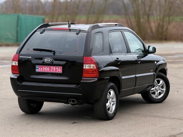 Черный Киа Sportage, объемом двигателя 2 л и пробегом 213 тыс. км за 8600 $, фото 8 на Automoto.ua