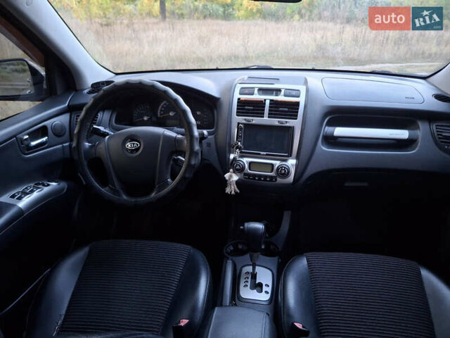 Черный Киа Sportage, объемом двигателя 2.7 л и пробегом 261 тыс. км за 8500 $, фото 4 на Automoto.ua