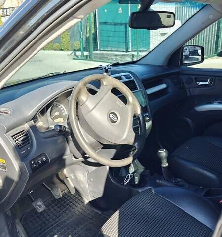 Черный Киа Sportage, объемом двигателя 1.98 л и пробегом 234 тыс. км за 8000 $, фото 14 на Automoto.ua