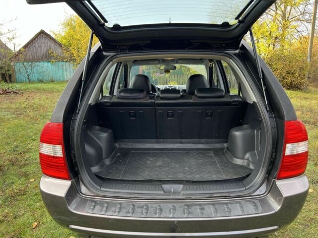 Черный Киа Sportage, объемом двигателя 2 л и пробегом 229 тыс. км за 4600 $, фото 12 на Automoto.ua