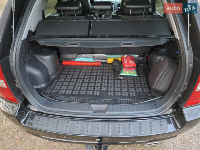 Черный Киа Sportage, объемом двигателя 2.7 л и пробегом 261 тыс. км за 8500 $, фото 9 на Automoto.ua