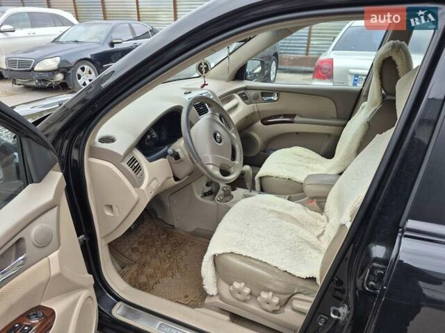 Черный Киа Sportage, объемом двигателя 2 л и пробегом 226 тыс. км за 7500 $, фото 10 на Automoto.ua