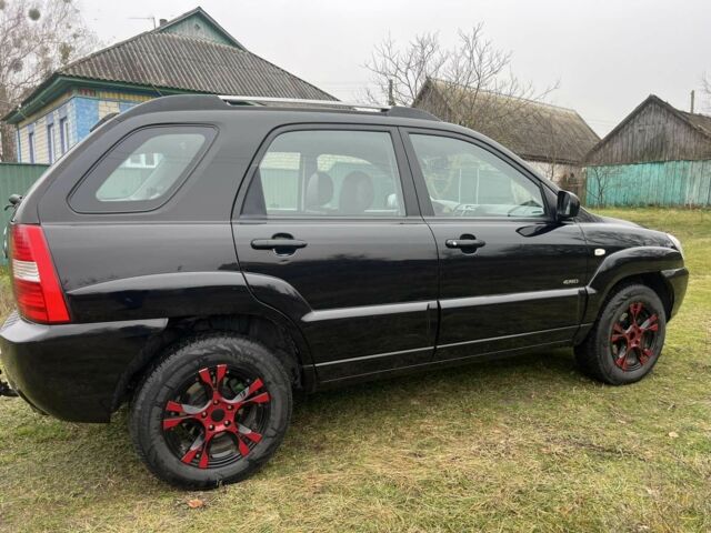 Чорний Кіа Sportage, об'ємом двигуна 2 л та пробігом 237 тис. км за 5100 $, фото 6 на Automoto.ua