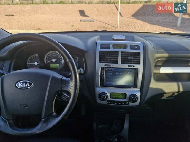Черный Киа Sportage, объемом двигателя 2 л и пробегом 202 тыс. км за 8300 $, фото 27 на Automoto.ua