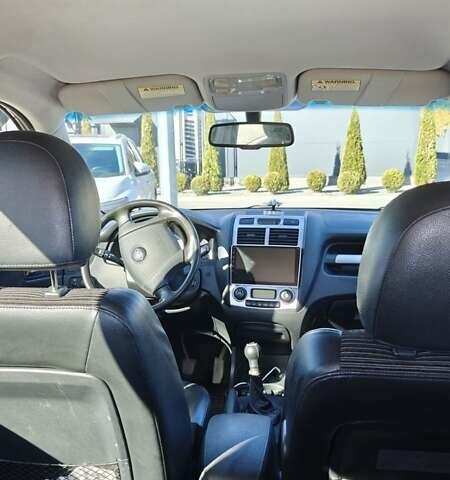 Черный Киа Sportage, объемом двигателя 1.98 л и пробегом 234 тыс. км за 8000 $, фото 19 на Automoto.ua