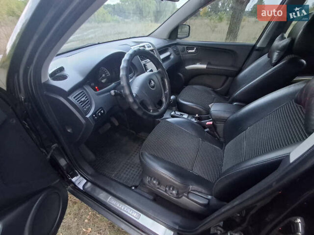 Черный Киа Sportage, объемом двигателя 2.7 л и пробегом 261 тыс. км за 8500 $, фото 8 на Automoto.ua