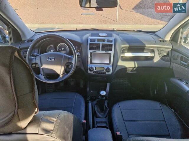 Черный Киа Sportage, объемом двигателя 2 л и пробегом 202 тыс. км за 8300 $, фото 25 на Automoto.ua