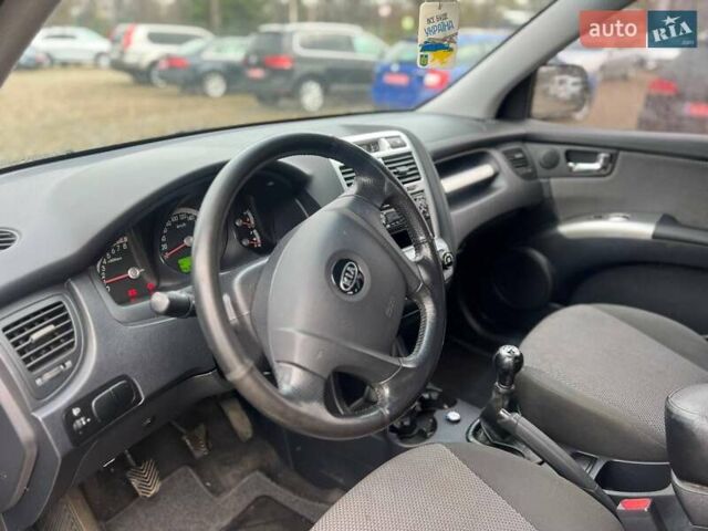 Черный Киа Sportage, объемом двигателя 1.98 л и пробегом 244 тыс. км за 8200 $, фото 11 на Automoto.ua