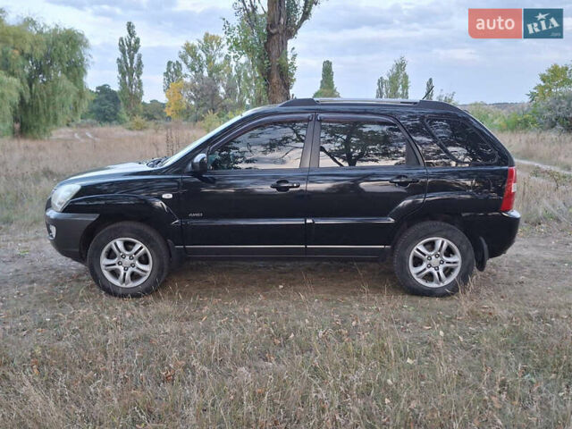 Черный Киа Sportage, объемом двигателя 2.7 л и пробегом 261 тыс. км за 8500 $, фото 2 на Automoto.ua