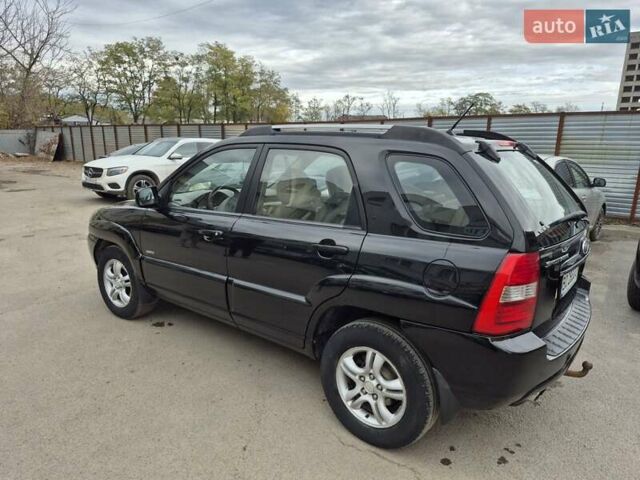 Черный Киа Sportage, объемом двигателя 2 л и пробегом 226 тыс. км за 7500 $, фото 9 на Automoto.ua