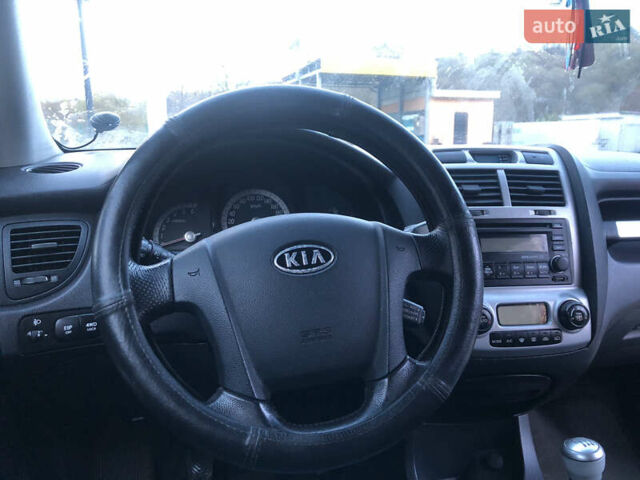 Черный Киа Sportage, объемом двигателя 2 л и пробегом 290 тыс. км за 7200 $, фото 19 на Automoto.ua