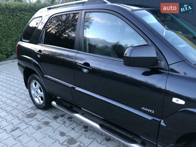 Черный Киа Sportage, объемом двигателя 2 л и пробегом 290 тыс. км за 7200 $, фото 13 на Automoto.ua