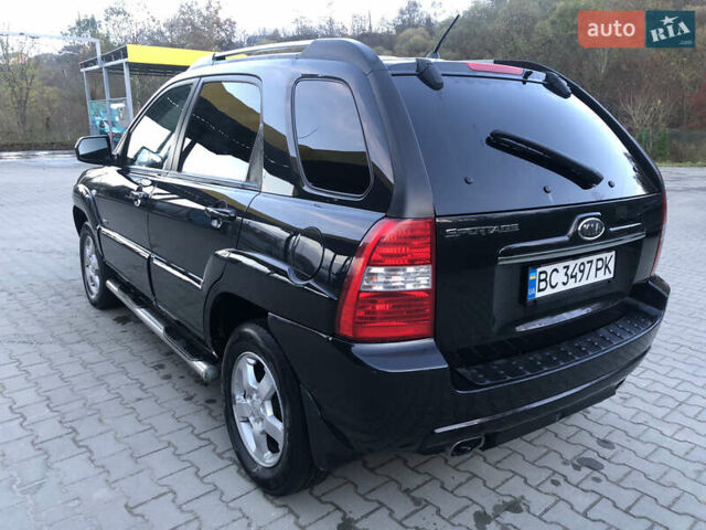 Черный Киа Sportage, объемом двигателя 2 л и пробегом 290 тыс. км за 7200 $, фото 8 на Automoto.ua