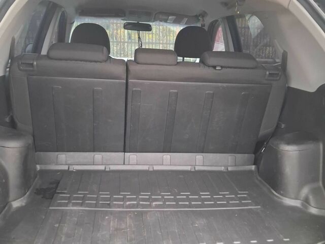 Черный Киа Sportage, объемом двигателя 2 л и пробегом 167 тыс. км за 9000 $, фото 8 на Automoto.ua