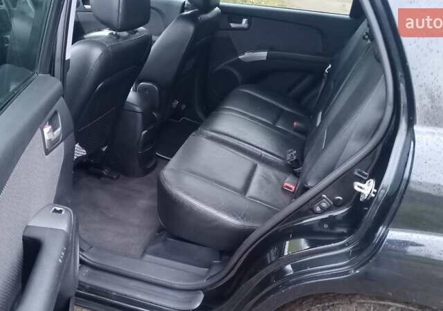 Черный Киа Sportage, объемом двигателя 2 л и пробегом 275 тыс. км за 7600 $, фото 8 на Automoto.ua