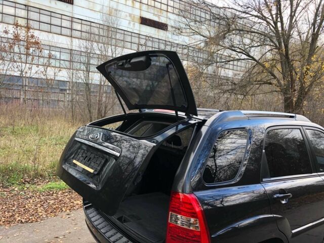 Черный Киа Sportage, объемом двигателя 2 л и пробегом 155 тыс. км за 7700 $, фото 20 на Automoto.ua
