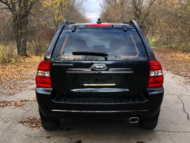 Черный Киа Sportage, объемом двигателя 2 л и пробегом 155 тыс. км за 7700 $, фото 4 на Automoto.ua