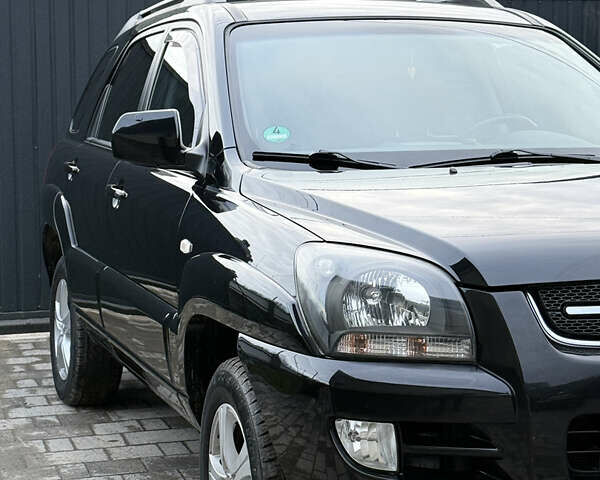 Чорний Кіа Sportage, об'ємом двигуна 2 л та пробігом 215 тис. км за 8600 $, фото 11 на Automoto.ua