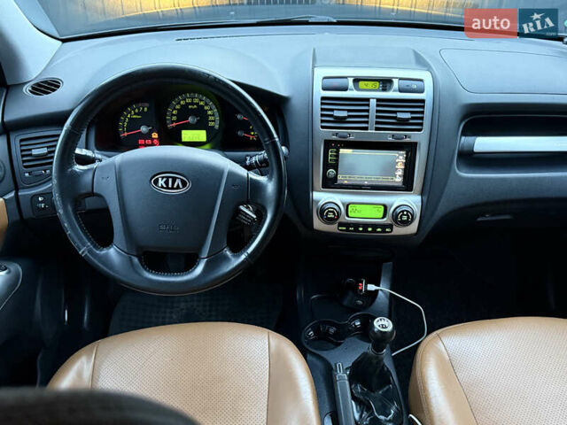 Чорний Кіа Sportage, об'ємом двигуна 2 л та пробігом 215 тис. км за 8600 $, фото 36 на Automoto.ua