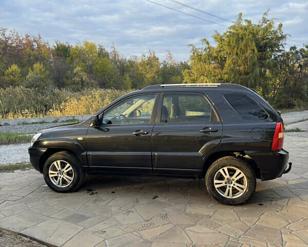 Чорний Кіа Sportage, об'ємом двигуна 1.99 л та пробігом 257 тис. км за 8500 $, фото 4 на Automoto.ua