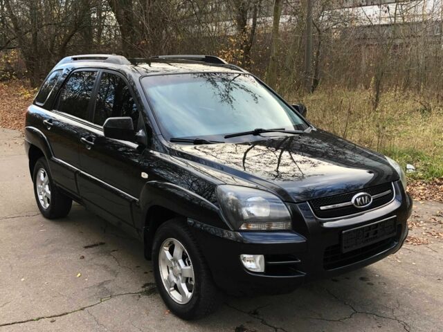 Черный Киа Sportage, объемом двигателя 2 л и пробегом 155 тыс. км за 7700 $, фото 1 на Automoto.ua