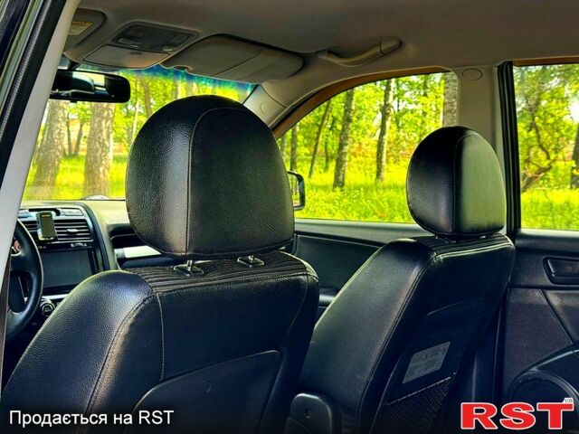 Черный Киа Sportage, объемом двигателя 2 л и пробегом 170 тыс. км за 7999 $, фото 6 на Automoto.ua