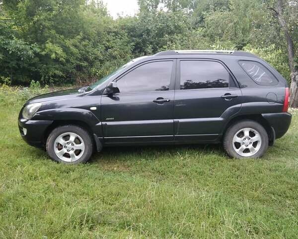 Чорний Кіа Sportage, об'ємом двигуна 2 л та пробігом 248 тис. км за 8600 $, фото 9 на Automoto.ua