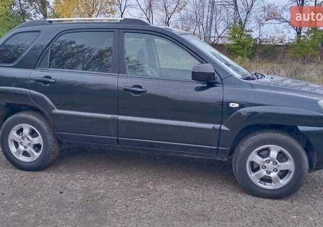 Черный Киа Sportage, объемом двигателя 2 л и пробегом 275 тыс. км за 7600 $, фото 6 на Automoto.ua