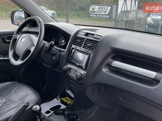 Черный Киа Sportage, объемом двигателя 1.98 л и пробегом 293 тыс. км за 6600 $, фото 19 на Automoto.ua