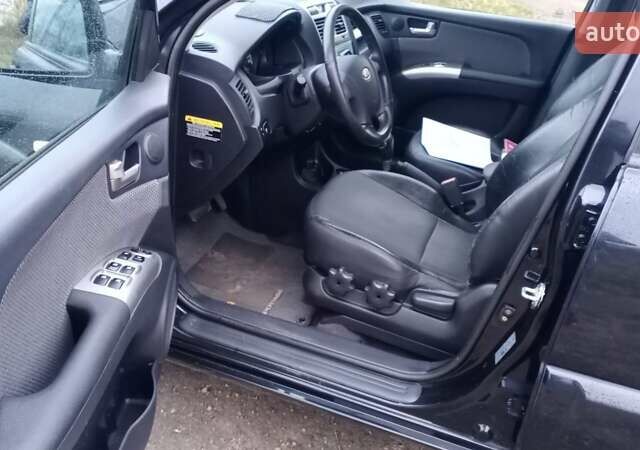Черный Киа Sportage, объемом двигателя 2 л и пробегом 275 тыс. км за 7600 $, фото 3 на Automoto.ua