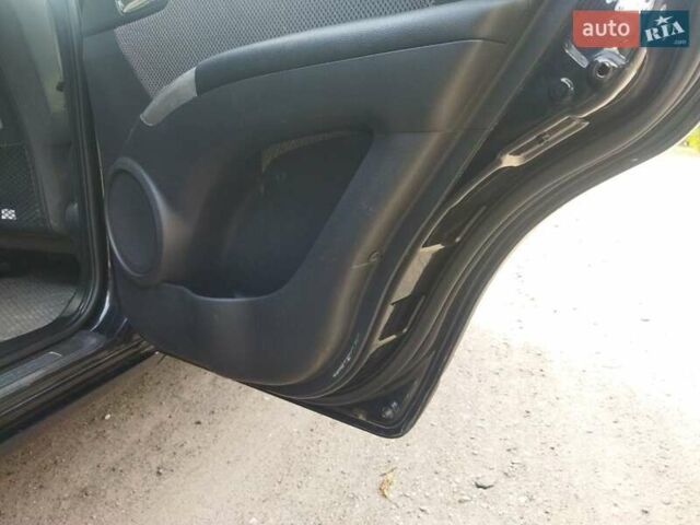 Черный Киа Sportage, объемом двигателя 2.66 л и пробегом 232 тыс. км за 7000 $, фото 9 на Automoto.ua