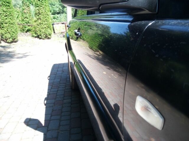 Черный Киа Sportage, объемом двигателя 2 л и пробегом 290 тыс. км за 5998 $, фото 10 на Automoto.ua