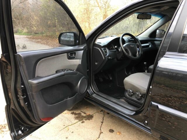 Черный Киа Sportage, объемом двигателя 2 л и пробегом 155 тыс. км за 7700 $, фото 10 на Automoto.ua