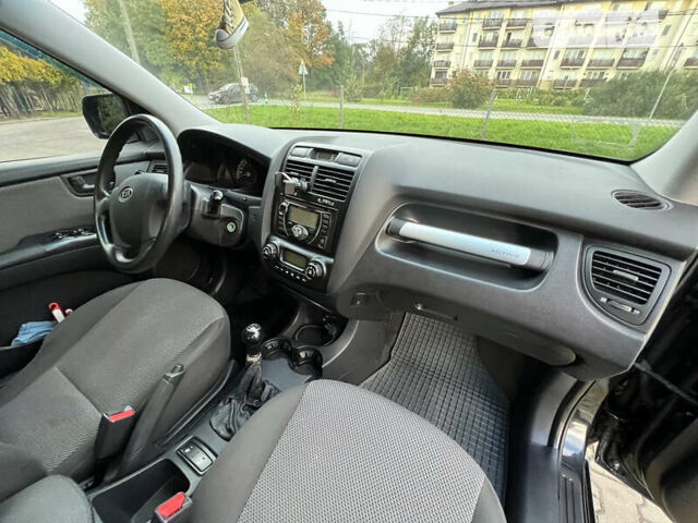 Черный Киа Sportage, объемом двигателя 1.98 л и пробегом 264 тыс. км за 6500 $, фото 40 на Automoto.ua