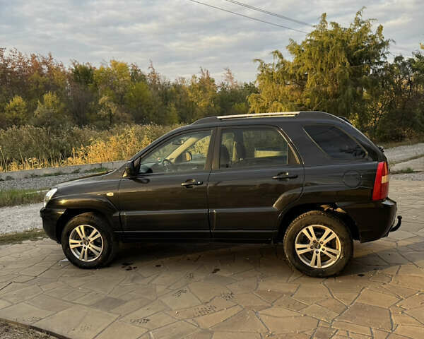 Черный Киа Sportage, объемом двигателя 2 л и пробегом 257 тыс. км за 10300 $, фото 3 на Automoto.ua
