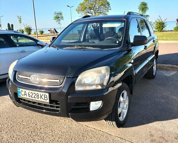 Черный Киа Sportage, объемом двигателя 2 л и пробегом 426 тыс. км за 6500 $, фото 1 на Automoto.ua