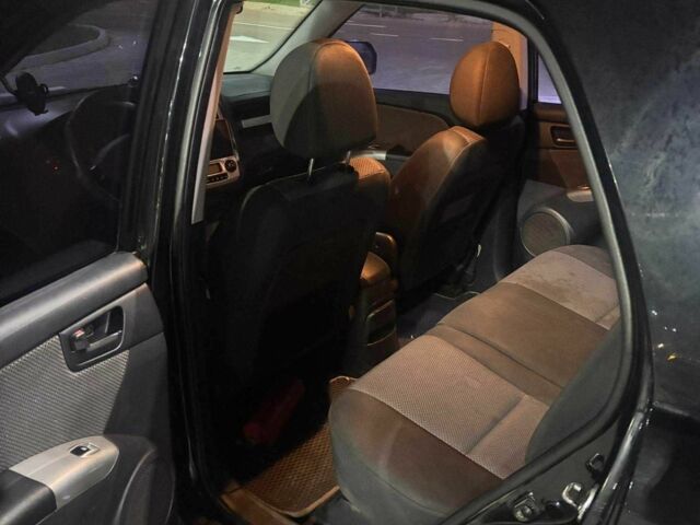 Черный Киа Sportage, объемом двигателя 2 л и пробегом 263 тыс. км за 6700 $, фото 4 на Automoto.ua