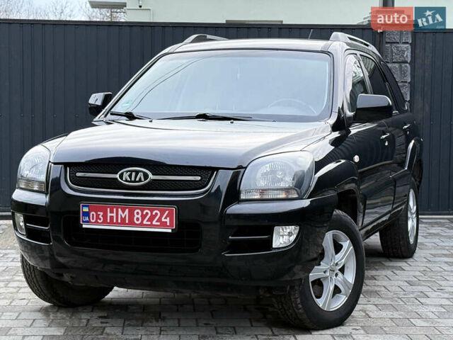Чорний Кіа Sportage, об'ємом двигуна 2 л та пробігом 215 тис. км за 8600 $, фото 20 на Automoto.ua