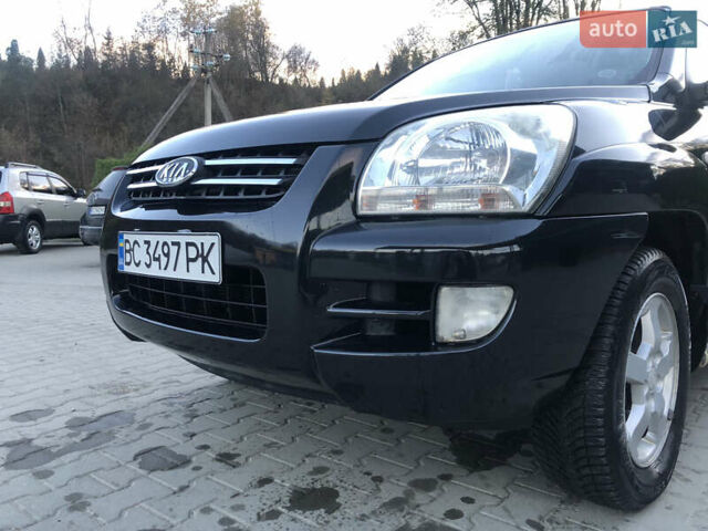 Черный Киа Sportage, объемом двигателя 2 л и пробегом 290 тыс. км за 7200 $, фото 3 на Automoto.ua
