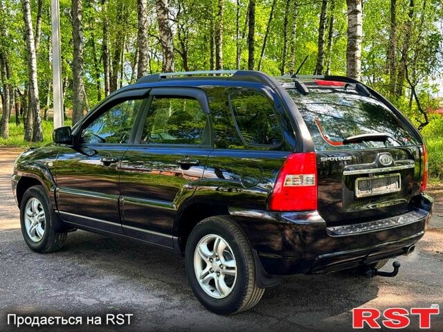 Черный Киа Sportage, объемом двигателя 2 л и пробегом 170 тыс. км за 7999 $, фото 2 на Automoto.ua