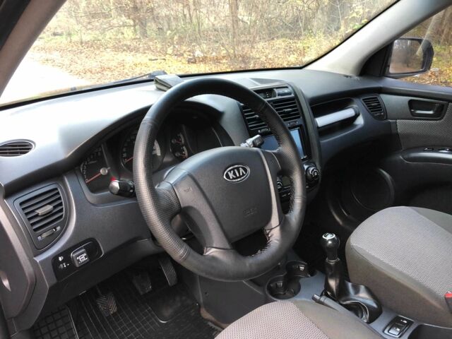 Черный Киа Sportage, объемом двигателя 2 л и пробегом 155 тыс. км за 7700 $, фото 11 на Automoto.ua
