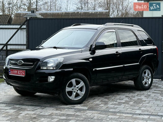 Чорний Кіа Sportage, об'ємом двигуна 2 л та пробігом 215 тис. км за 8600 $, фото 22 на Automoto.ua