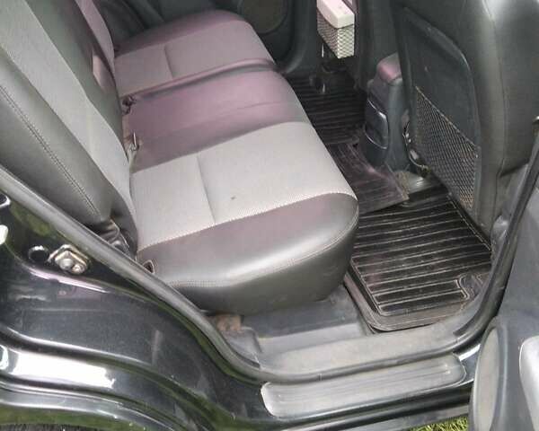 Чорний Кіа Sportage, об'ємом двигуна 2 л та пробігом 248 тис. км за 8600 $, фото 6 на Automoto.ua